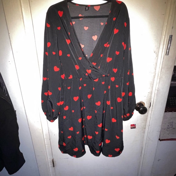 Silky open low cut, long sleeve heart mini dress. Never worn. - Picture 1 of 3